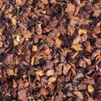Bark Mulch 20-40mm DECOARTIVE Decorative bark mulch 20-40mm applied in a garden bed around shrubs, offering moisture retention and aesthetic appeal.